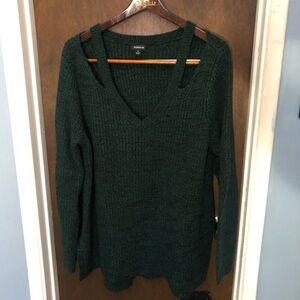 Green Torrid sweater.